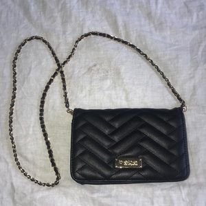 Black and gold Bebe purse